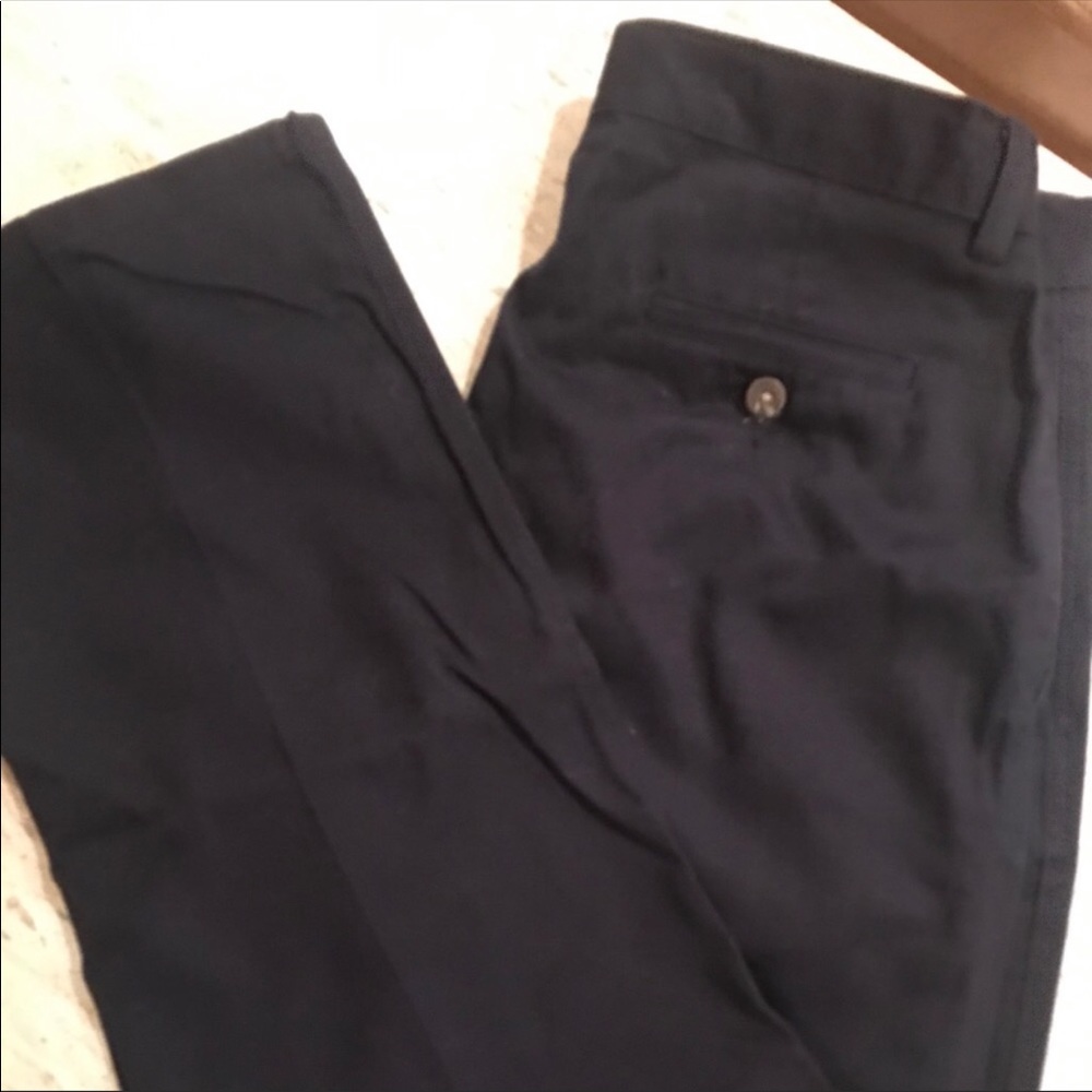 Chaps boys chino pants on navy blue
